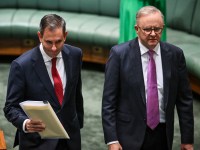 CANBERRA, AUSTRALIA - MAY 14: AustraliaÃ¢â¬â¢s Treasurer Jim Chalmers (L) and Prime Minister Anthony Albanese arrive before Chalmers delivers his budget speech at Parliament House on May 14, 2024 in Canberra, Australia. Australia's Labor government is grappling with a slowing economy, weaker commodity prices, soaring housing costs and a softening labor market as it prepares to unveil its federal budget on May 14. To counter these headwinds, the budget is expected to feature smaller revenue upgrades compared to recent years, while outlining the government's interventionist policies aimed at boosting domestic manufacturing and the transition to green energy. Critics warn that such industrial policies risk fueling inflation and diverting resources from more productive sectors of the economy. The budget is seen as a key opportunity for the Labor government to deliver broad economic support that analysts say is fundamental to re-election chances next year. (Photo by Tracey Nearmy/Getty Images)