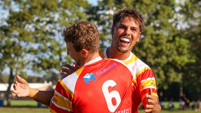 Ronan Singleton (right) and Jett McCarthy (left) celebrate a try. Picture: D Wigley