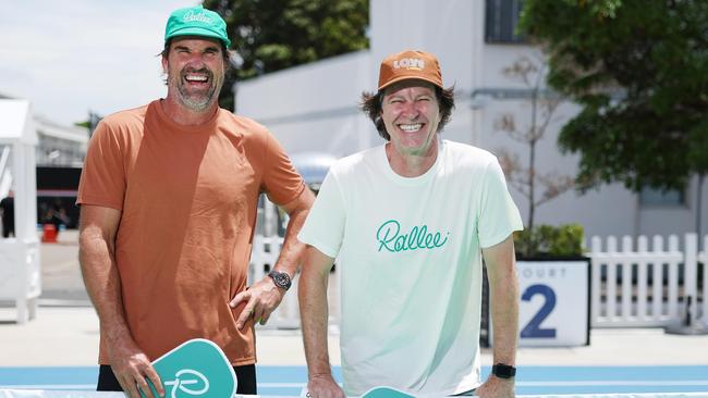 Pat Rafter and business partner Bernard Fanning promoting their new clothing brand Rallee at the Racquet Club in Moore Park. Picture: Rohan Kelly