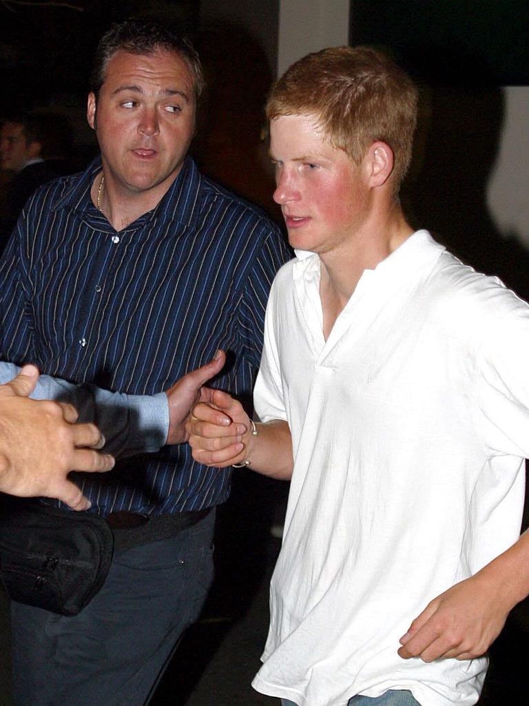 NOVEMBER 15, 2003: Prince Harry leaves the Hugo Bar on Bayswater Road, Kings Cross after a night out on the town in Sydney. Picture: Glenn Miller.