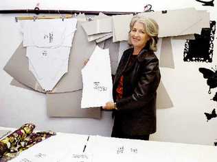 ACE teacher Gillian Jones with pattern blocks currently used in dress-making. However fashion designer Lois Hennes has introduced a new concept in clothing design based on fitting a woman’s shape, not her size. . Picture: Cathy Adams