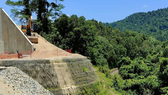 A cassowary crossing over the Bruce Highway near Feluga has been dubbed a $30m white elephant after new pics reveal a near vertical cliff that makes access by the flightless birds almost impossible. Picture: Christopher Duffy