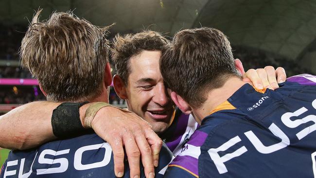 Melbourne's Billy Slater celebrates victory at full time after the Cronulla Sharks v Melbourne Storm NRL Preliminary Final at AAMI Park, Melbourne. Picture: Brett Costello