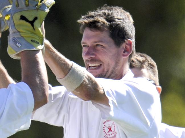 s38ms945 VTCA South Grand Final. Dingley v Heatherton at Bentleigh Reserve, Bentleigh. Heatherton's bowler Dave Dervan celebrates a wicket with keeper Luke McConnell and team mates.