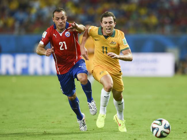 Tommy Oar of the Socceroos (right) is another high-profile graduate of All Saints. (AAP Image/Lukas Coch)