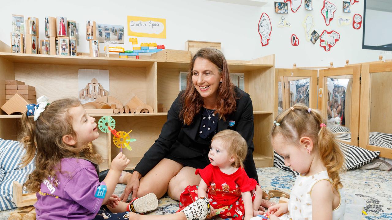 Ms Emme plays with pupils Isla, Joy and Isabelle as demand for childcare centres surges in high growth areas like Western Sydney. Picture: Max Mason-Hubers