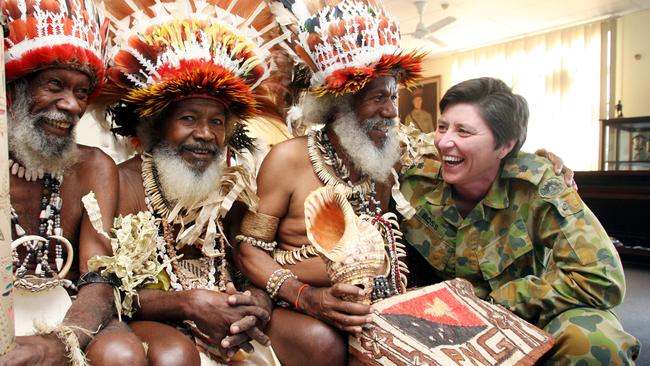 Lieutenant Colonel Bernadette Boss, commanding officer of Sydney University Regiment, with Fuzzy Wuzzy Angels Frederick Soka, Davidson YariYari and Benjamin Ijumi.