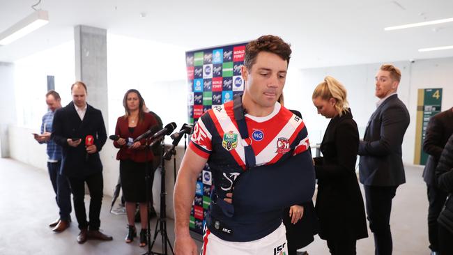 Cronk with his arm in a sling on Monday. Picture: Brett Costello