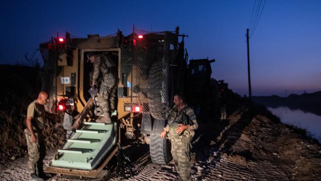 The first group of Turkish infantry prepare to enter Syria at Akcakale on the border between Turkey and Syria. Picture: Getty Images.