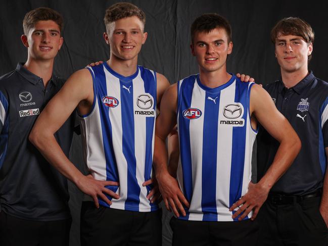 MELBOURNE , AUSTRALIA. November 20, 2023. AFL Draft at Marvel Stadium .  Number 4 pick Zane Duursma (left) and Number 2 pick Colby McKercher  (right) with Harry Sheezel and George Wardlaw . Pic: Michael Klein