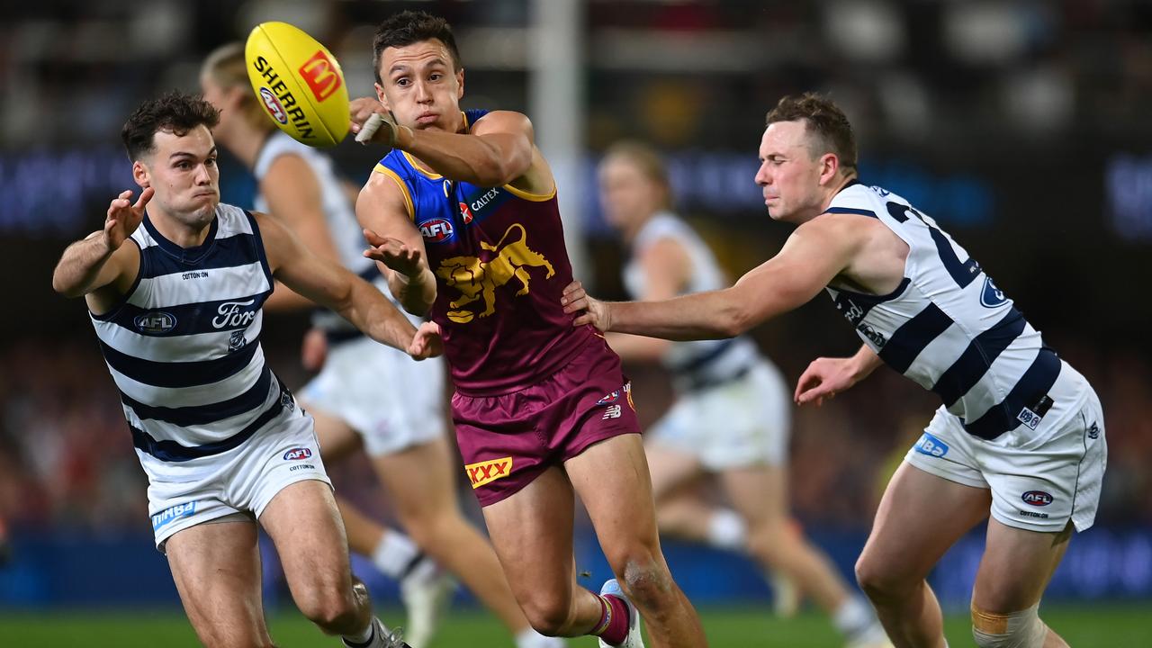 Hugh McCluggage fires out a handpass in Brisbane’s win over Geelong. Picture: Albert Perez/AFL Photos