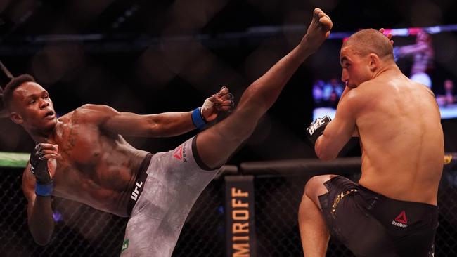 Israel Adesanya and Robert Whittaker during UFC 243 in 2019. (AAP Image/Michael Dodge)