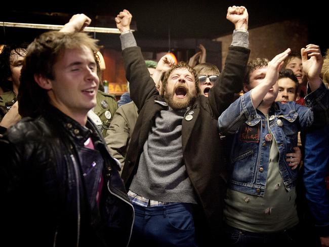 Richard Dormer, centre, is Terri Hooley in <i>Good Vibrations</i>.