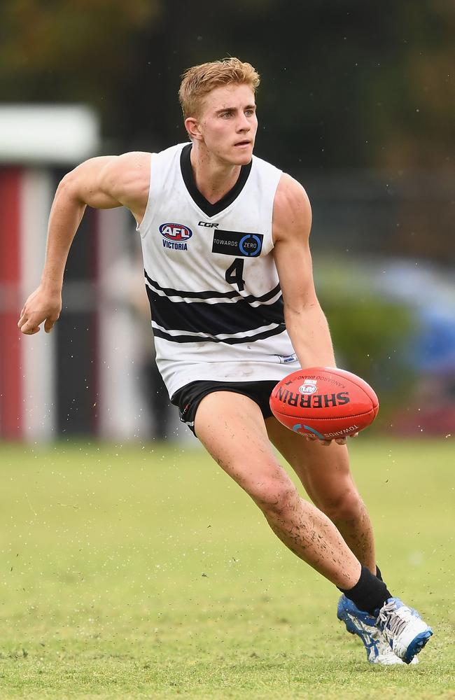 Tom McKenzie gets a handball away for Northern Knights. Picture: Getty Images.