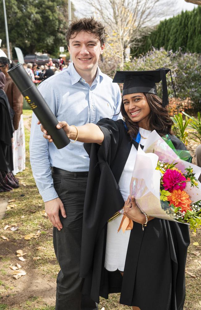 Valedictorian and Master of Clinical Psychology graduate Shameta Siva celebrates with Curtis Green at a UniSQ graduation ceremony at The Empire, Tuesday, June 25, 2024. Picture: Kevin Farmer