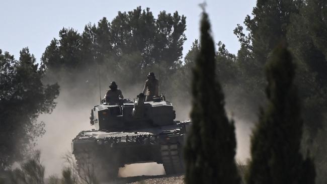 Ukrainian military personnel receive armoured manoeuvre training on German-made Leopard 2 battle tanks.