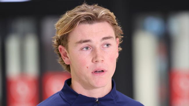 Geelong Cats players arrive back at Melbourne Airport following their Qualifying Final win against Port Adelaide. Geelong midfielder Tanner Bruhn.                Picture: David Caird