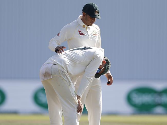 LEEDS, ENGLAND - AUGUST 25: Nathan Lyon and Usman Khawaja of Australia look dejected after day four of the 3rd Specsavers Ashes Test match between England and Australia at Headingley on August 25, 2019 in Leeds, England. (Photo by Ryan Pierse/Getty Images)