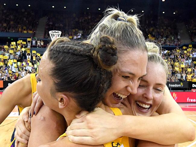 Winners are grinners. Caitlin Bassett celebrates last years victory with team mates.