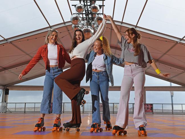 30/09/20 - Hannah Dubsky, Jess Rogers, Layla Wallace and Vanessa Litt at the temporary roller skating rink - Bay City Rolling  in Moseley Square for the holidays. Picture: Tom Huntley