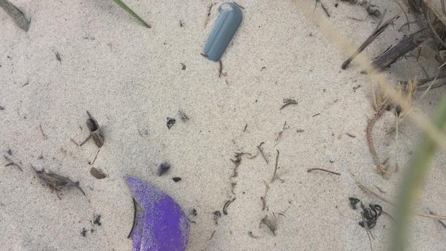 Nitrous oxide canisters or nang with a balloon, often used with nangs. Picture: Nic McElroy