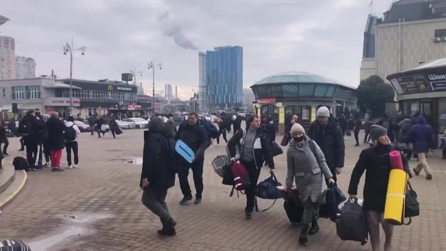 Residents rushing to take shelter as an air raid siren wails in Kyiv yesterday: Picture: AFP / Radio RMF Poland