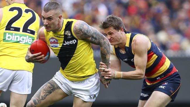 Matt Crouch tries to stop Richmond champion Dustin Martin in the grand final. Picture: SARAH REED