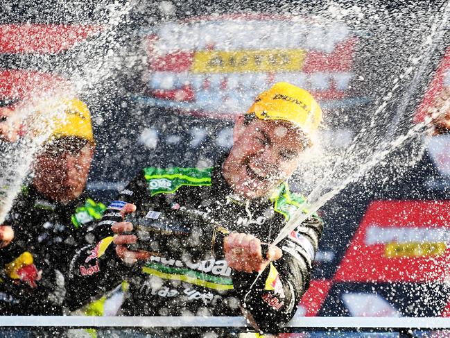 Craig Lowndes celebrates another win at the famous Mt Panorama circuit.