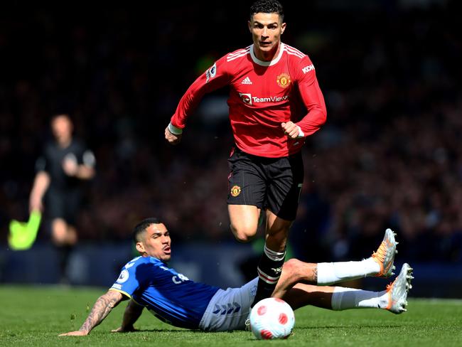 Manchester United superstar Cristiano Ronaldo beats Allan of Everton in the Premier League last season. Picture: Clive Brunskill/Getty Images