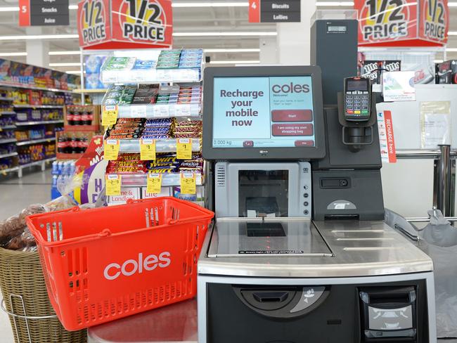 A shopping basket is arranged for a photograph next to a self checkout counter in a Coles supermarket, operated by Wesfarmers Ltd., in Melbourne, Australia, on Tuesday, Feb. 23, 2016. Wesfarmers, Australia's largest retailer, is scheduled to report interim results on Feb. 24. Photographer: Carla Gottgens/Bloomberg via Getty Images