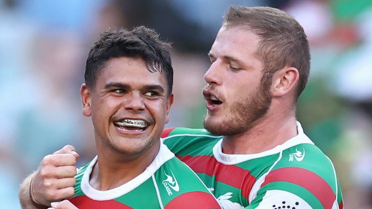 SYDNEY, AUSTRALIA - APRIL 02: Latrell Mitchell of the Rabbitohs celebrates scoring a try with team mate Tom Burgess of the Rabbitohs during the round four NRL match between the Canterbury Bulldogs and the South Sydney Rabbitohs at Stadium Australia, on April 02, 2021, in Sydney, Australia. (Photo by Cameron Spencer/Getty Images)