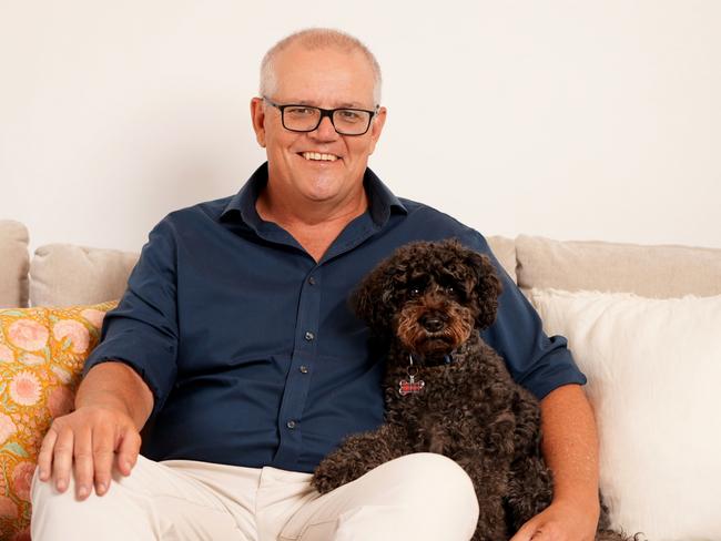 Scott Morrison with family dog Buddy, who is mentioned in the opening lines of his new book, Plans for Your Good: A Prime Minister’s Testimony of God’s Faithfulness. Pictures: Adam Taylor