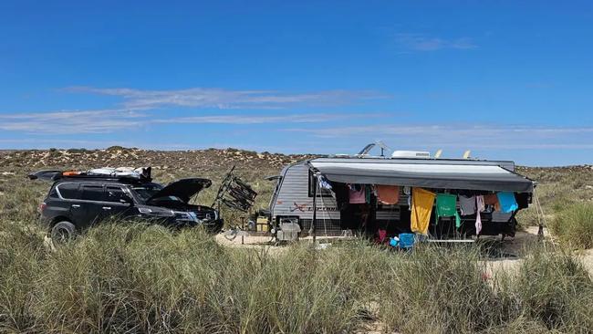 The family’s caravan set up during a stop at South Lefroy Bay in Western Australia.