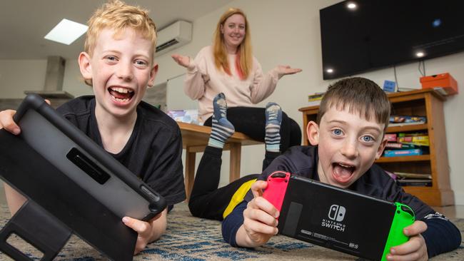 Bree Britt has had to wind back strict screen time rules for sons Makalo, 9, and Emmett, 6, after the state’s lockdowns. Picture: Jason Edwards