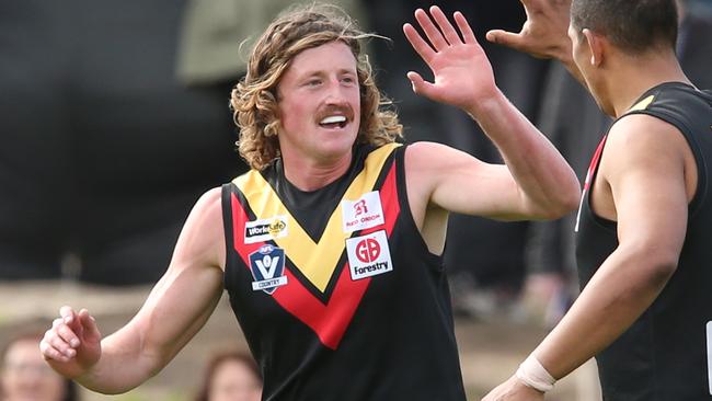 Declan Phyland celebrates a goal for Bacchus Marsh. Picture: David Crosling