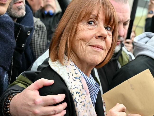 TOPSHOT - Gisele Pelicot leaves the courthouse after hearing the verdict of the court that sentenced her ex-husband to the maximum term of 20 years jail for committing and orchestrating her mass rapes with dozens of strangers he recruited online, in Avignon on December 19, 2024. Dominique Pelicot, who had already confessed to the crimes, was earlier found guilty by the court in the southern city of Avignon after an over three-month trial that shocked France and turned his former wife Gisele into a feminist hero. His 50 co-defendants in the case were also convicted by the court, with no acquittals. (Photo by Miguel MEDINA / AFP)