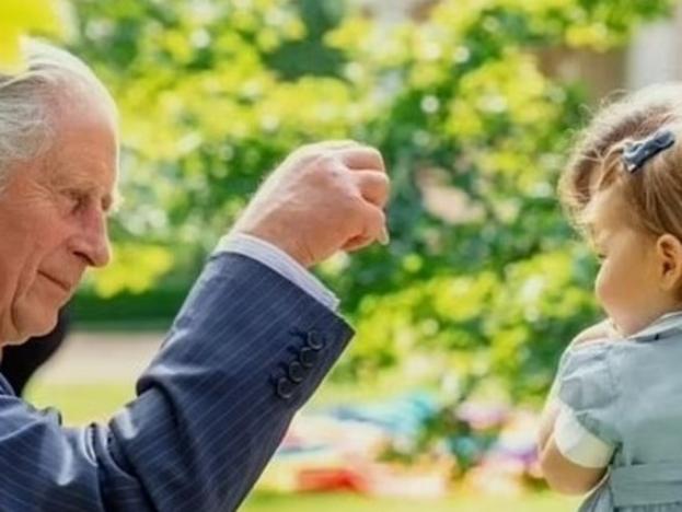 Prince George and Princess Charlotte with King Charles , The never-before-seen family pictures were aired in the new BBC documentary, Charles R: The Making of a Monarch.  Picture: BBC