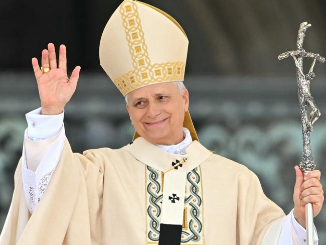 Pope Leo XIV waves after delivering the Regina Caeli prayer after a Holy Mass for the Beginning of his Pontificate, in St Peter's square in the Vatican. Picture: Alberto Pizzoli/AFP