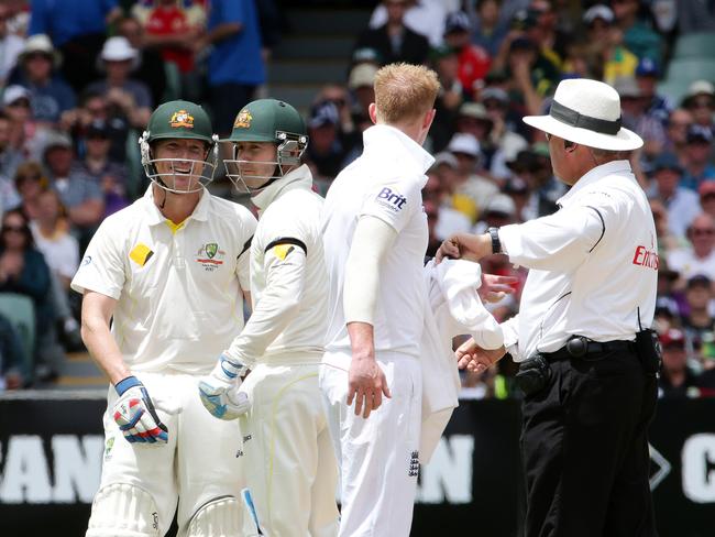 6.12.2013 - Ashes 2nd Test, Australia v England, Adelaide Oval - Day 2. Brad Haddin and Ben Stokes continue their verbal exchange - Michael Clarke steps in between them. PIC SARAH REED.