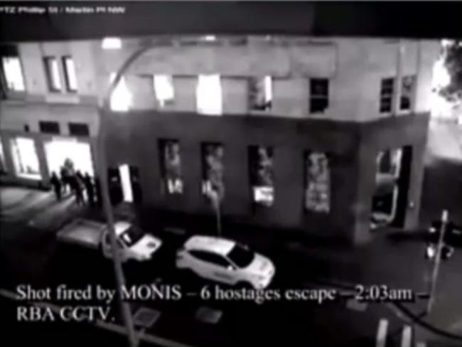 Monis fired his first shot at six escaping hostages at 2.03am.