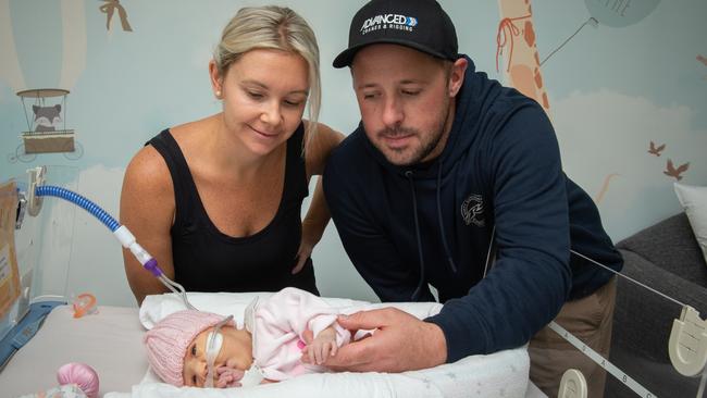 Emma and Adam Tuddenham with daughter Bella. Picture: Heartfelt Foundation