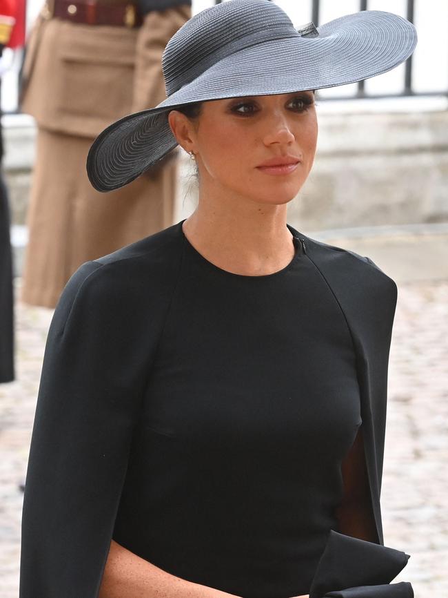 Meghan, Duchess of Sussex wore pearl and diamond earrings gifted to her by Her Majesty. Picture: Geoff Pugh/AFP