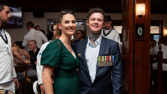 James Veness and Liz Breeze as ADF personnel crowd into Darwin pubs to celebrate Anzac Day. Picture: Pema Tamang Pakhrin