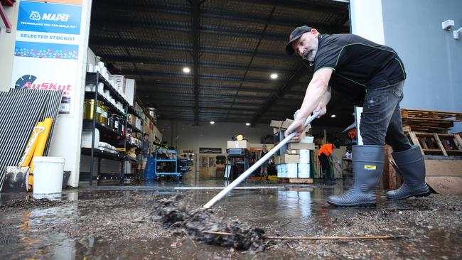 Shaun Craig cleans out his factory. Picture: Glenn Hampson