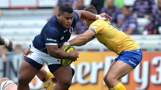 Taniela Tupou of Queensland Country takes on the defence during the round seven NRC match between Brisbane City and Queensland Country at Ballymore Stadium on October 9, 2016 in Brisbane, Australia. (Photo by Bradley Kanaris/Getty Images)