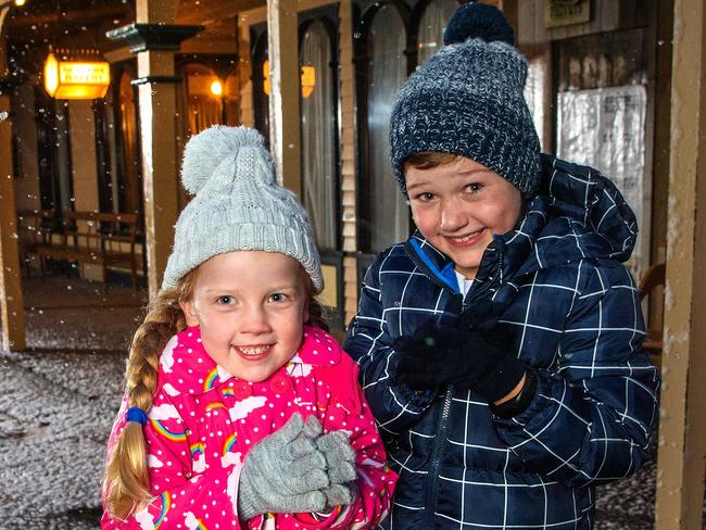 HOLD FOR WEEKEND PAPER.  Darcy, 7, and Georgia, 5, enjoy keeping warm at the Winter Wonderlights at Sovereign Hill in Ballarat. Picture: Mark Stewart