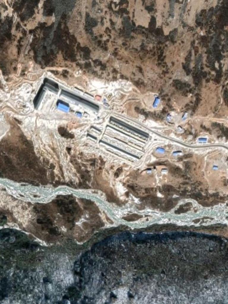 Construction of the village beside a river wholly within Bhutan. Picture: Google Maps.