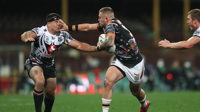 Tigers Sam McIntyre scores a try during the Wests Tigers v Warriors NRL match at the SCG. Picture: Brett Costello