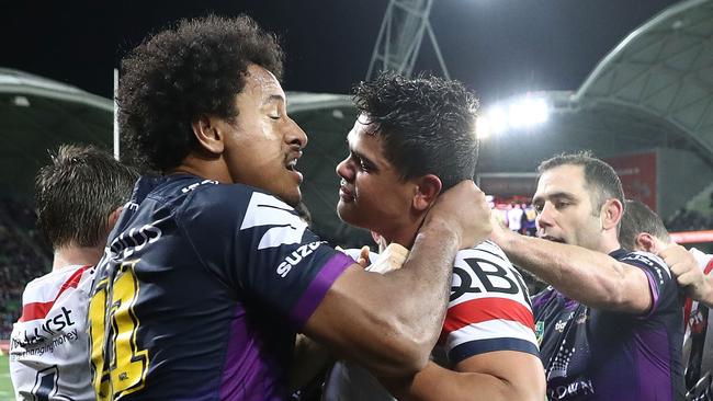 MELBOURNE, AUSTRALIA — AUGUST 12: Players wrestle during the round 23 NRL match between the Melbourne Storm and the Sydney Roosters at AAMI Park on August 12, 2017 in Melbourne, Australia. (Photo by Robert Cianflone/Getty Images)