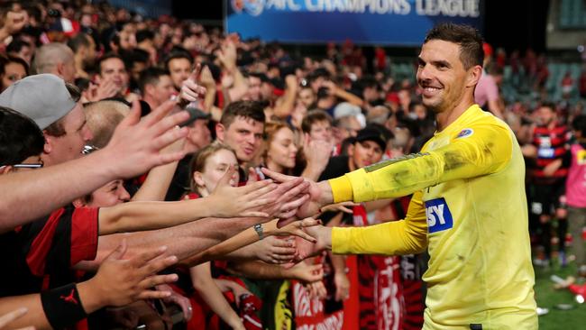 Wanderer's goalie Ante Covic celebrates with fans after full time last weekend. (Gregg Porteous)